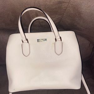 blush pink/nude Kate Spade purse. :)